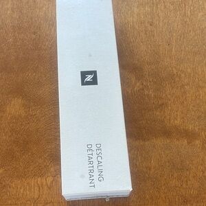 Nespresso Descaling Solution in Silver Box Opened but never used.